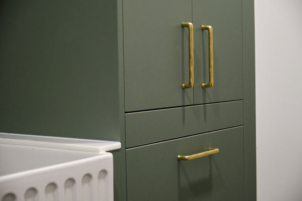 Antique brass handles on Kirsty's custom laundry