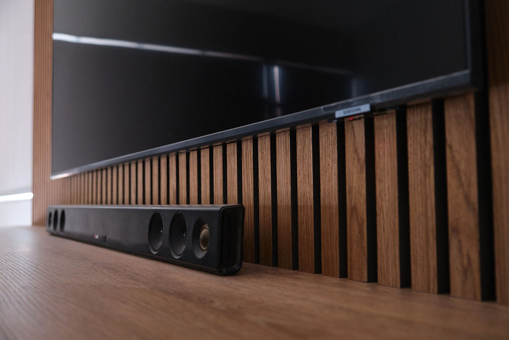custom TV unit with walnut slats melamine bench top